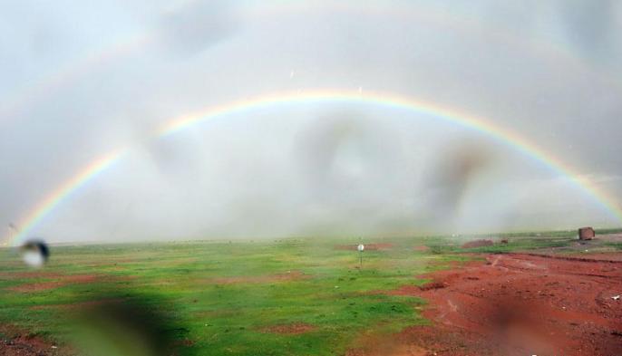 科考隊員在茲格塘錯采樣返程途中，高原風雨彩虹送行?！?lt;a target='_blank' ><p  align=