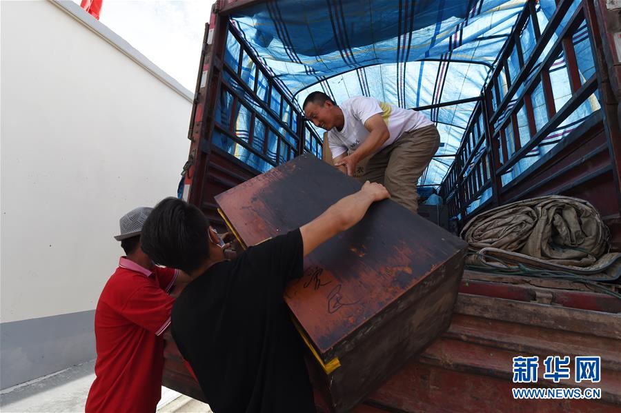 （新華全媒+）（26）千里“挪窩”，踏實(shí)開啟新生活