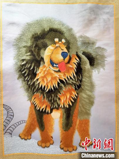 圖為藏繡作品?！∑钤鲚?攝