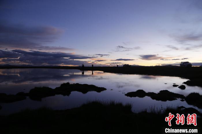 圖為夕陽下的查旦濕地?！●R銘言 攝