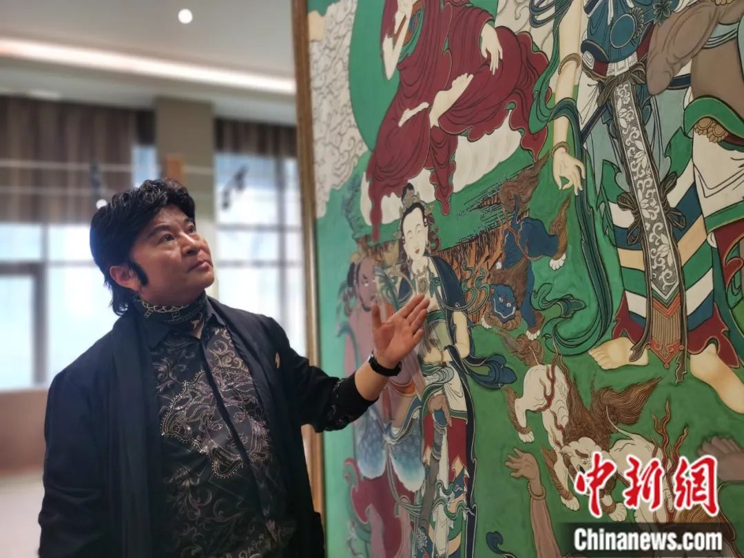 國家一級美術(shù)師劉觖。張?zhí)砀?攝